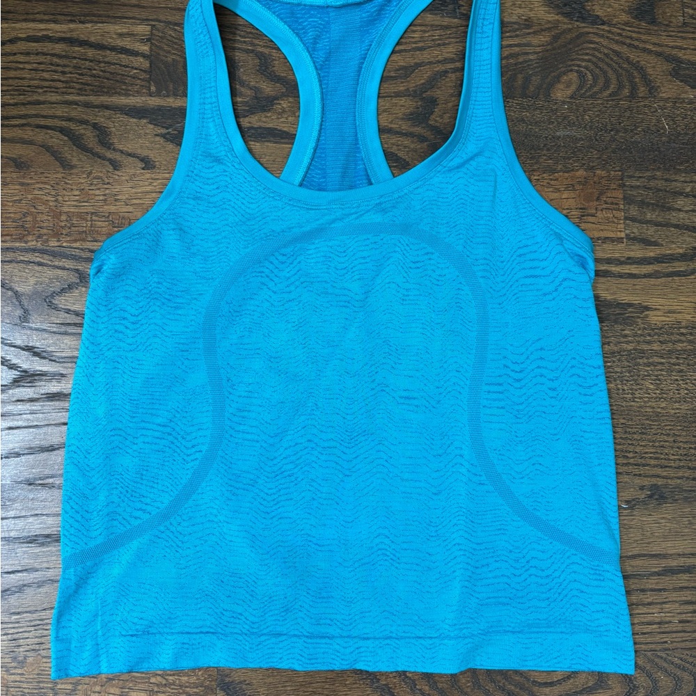Women's Lululemon Swiftly Tech Racerback Tank Top, waist length.